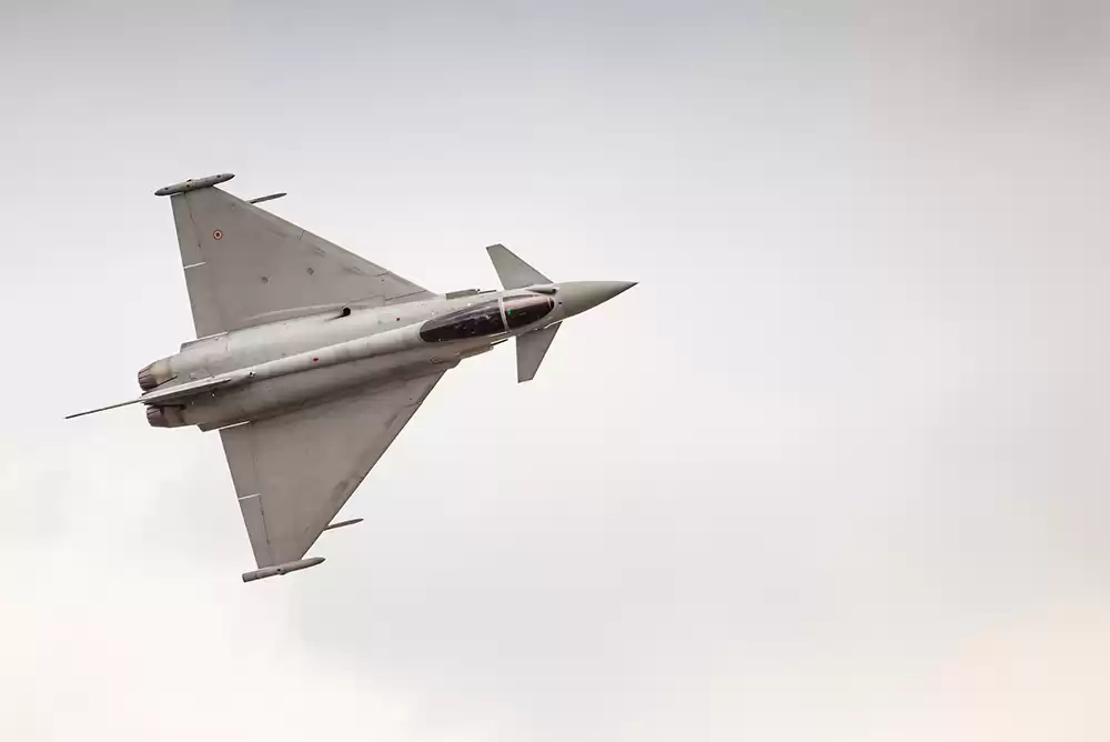 modern jet in flight during an air show